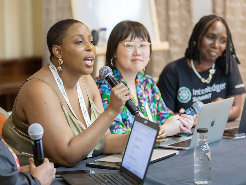 Victoria Coker speaking at a roundtable discussion at 2023 Summit