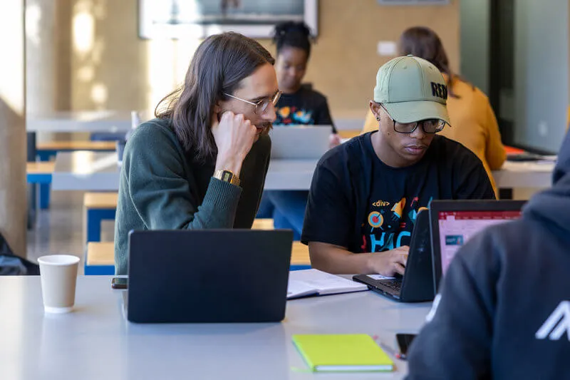 Max with a UCT student during the hackathon