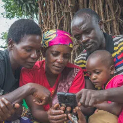 People looking at a mobile device